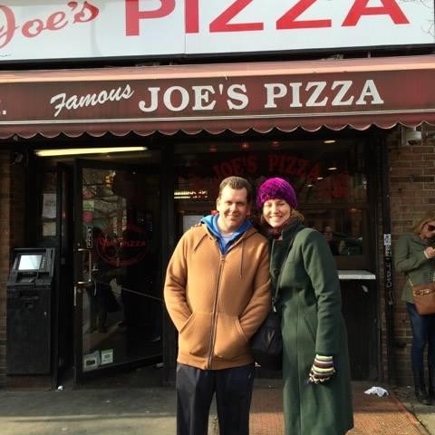 a man standing in front of a store
